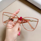 Lightning Cat Eye Blue Light Blocking Glasses in Translucent Coral Pink with Gold Lightning Temples