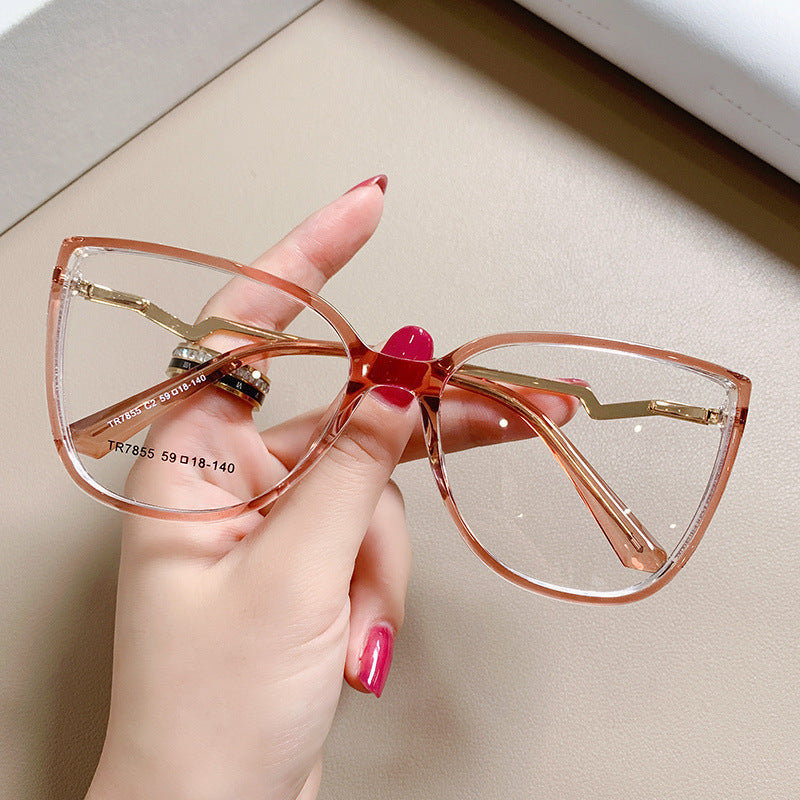Lightning Cat Eye Blue Light Blocking Glasses in Translucent Coral Pink with Gold Lightning Temples