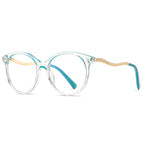 Wavy Metal Temple Round Blue Light Blocking Glasses in Crystal Clear with Teal Brow