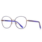 Ladder Temple Metal Round Blue Light Blocking Glasses in Rose Gold with Purple Enamel Rim