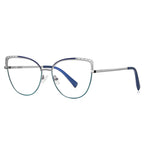 Eyelet Brow Metal Cat Eye Spring Hinge Blue Light Blocking Glasses in Polished Silver with Cobalt Navy Enamel Brow, Cutout Eyelet Wings, and Teal Green Gradient Lower Rim