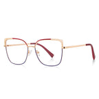 Filigree Corner Metal Butterfly Spring Hinge Blue Light Blocking Glasses in Polished Gold and Crimson Red with Cobalt Accent